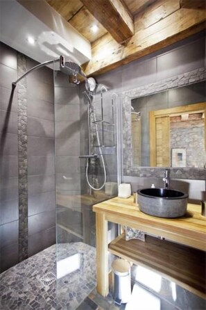 Bathtub, hair dryer, towels, soap