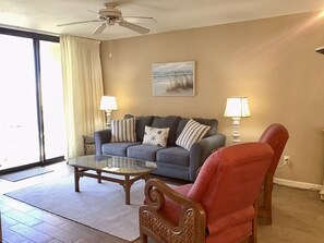 TV, DVD player, books - #711C - Brand New Upgrades Include New Tile, New Carpet And Restored Bathrooms!  (Panama City Beach)