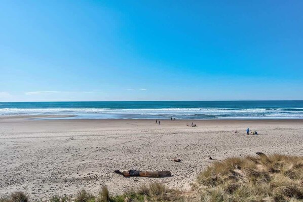 Enjoy a serene beach experience with access to the ocean and soft sand.