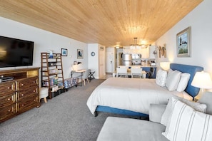 Enjoy a comfortable stay in this well-appointed room with a large bed, desk, and kitchenette.
