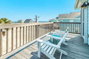 Relax on the ocean-view deck with two Adirondack chairs and take in the surrounding views.