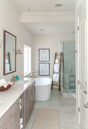 Combined shower/tub, hair dryer, towels, soap