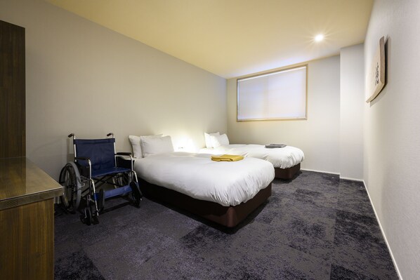 Habitación estándar con 2 camas individuales, para no fumadores (Barrier Free Room) | Caja de seguridad en la habitación, escritorio y wifi gratis 