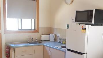 2 Bedroom Cabin with Kitchenette | Private kitchenette | Full-size fridge, microwave, stovetop, electric kettle
