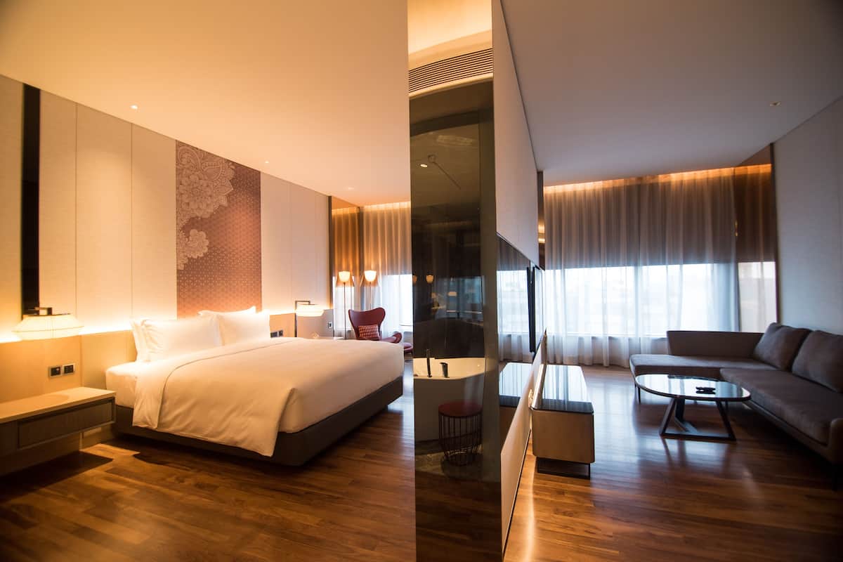 Premium bedding, down comforters, free minibar, in-room safe