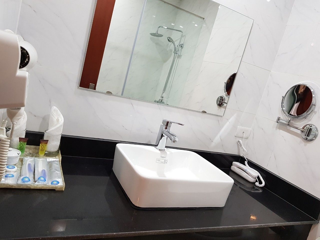 Shower, free toiletries, hair dryer, slippers