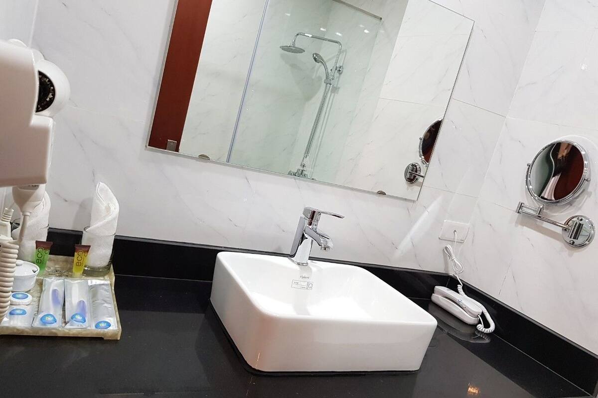 Shower, free toiletries, hair dryer, slippers