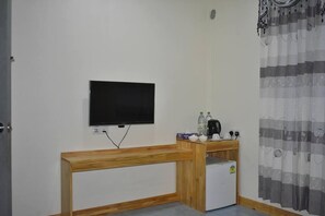 Quarto casal ou duplo luxo, 1 cama King | TV