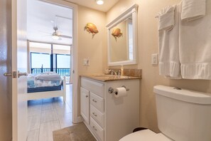 Bathtub, hair dryer, towels, soap