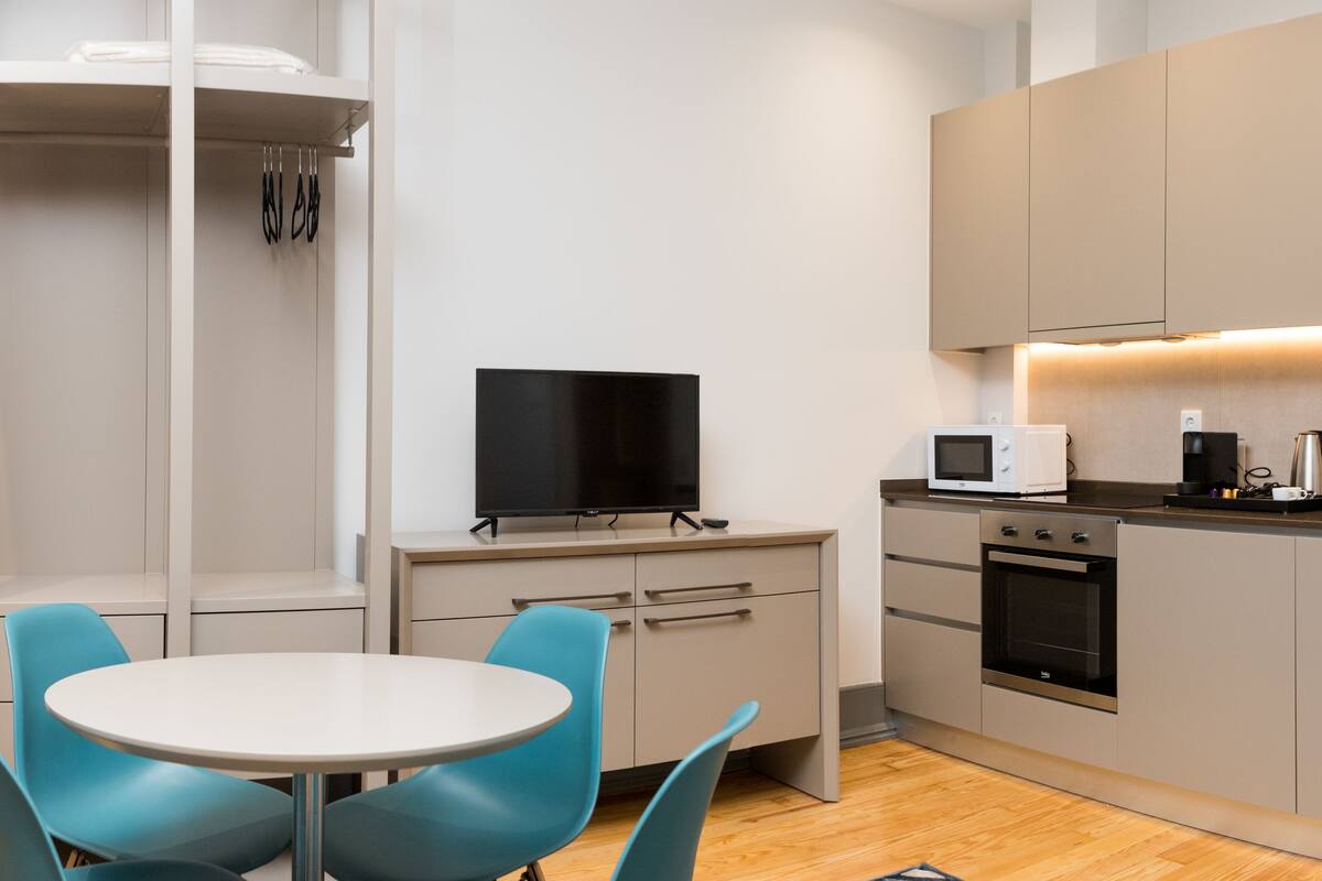 Studio, City View (3) | Living area | 32-inch flat-screen TV with cable channels, LCD TV