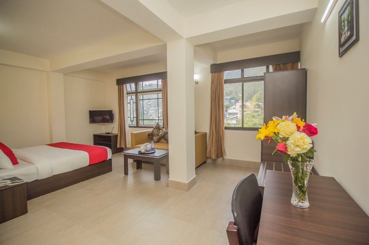 Family Suite, 1 King Bed, Smoking, Mountain View | 1 bedroom, desk, blackout curtains, iron/ironing board (on request)
