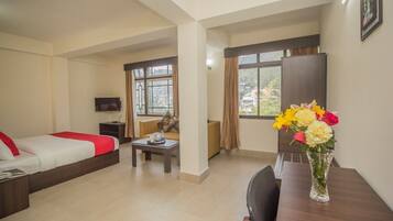 Family Suite, 1 King Bed, Smoking, Mountain View | 1 bedroom, desk, blackout curtains, iron/ironing board (on request)