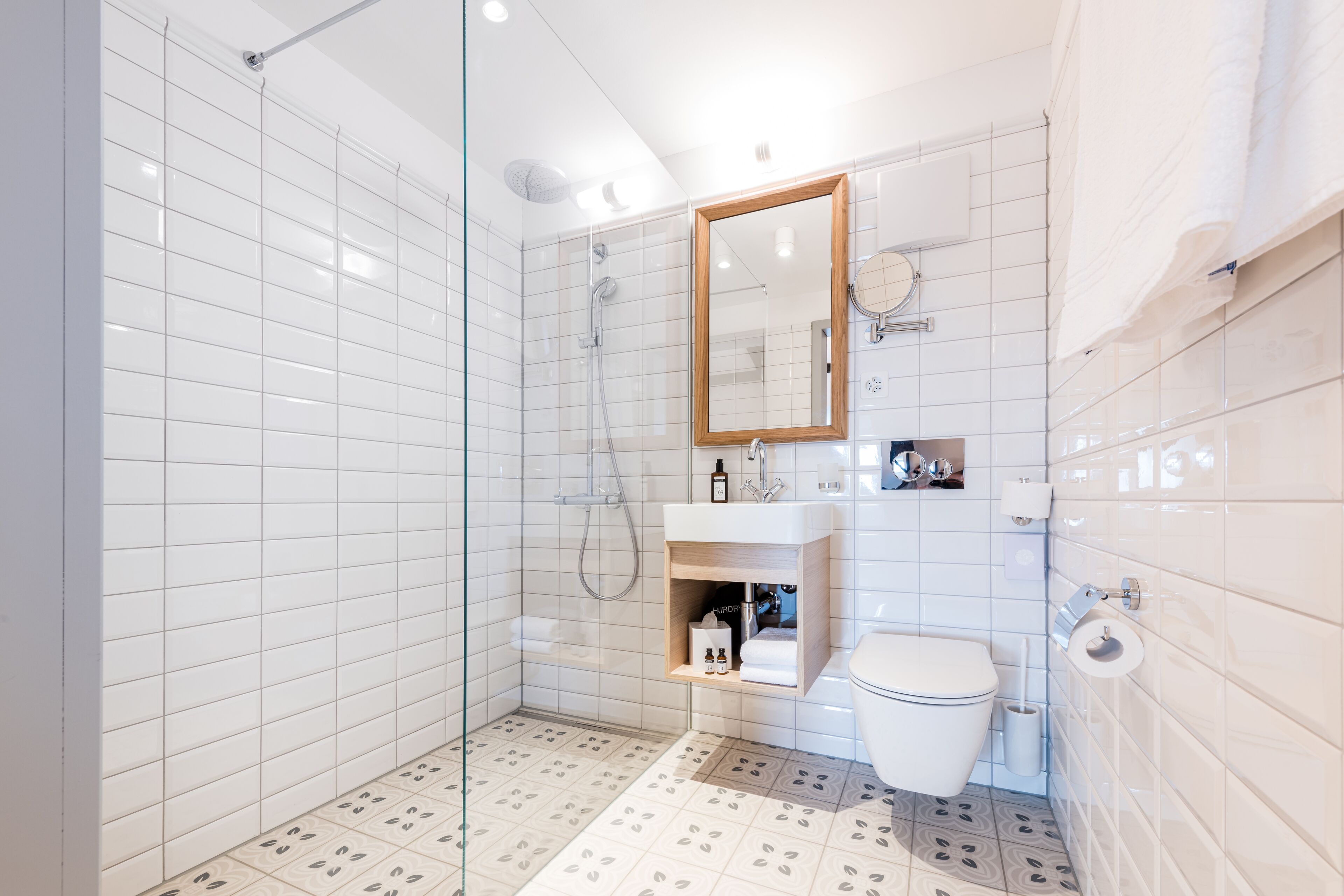 hair dryer, towels, soap, shampoo