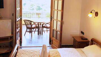 Basic Double Room, Pool View | Blackout drapes, soundproofing, iron/ironing board