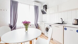 Comfort Quadruple Room, Ground Floor | Private kitchen | Fridge, microwave, stovetop, electric kettle - Apart Hotel Rishelye (Odesa)
