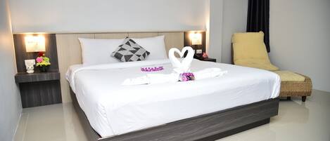 Economy Room | Blackout drapes, free WiFi, bed sheets