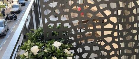 Quarto triplo luxo, sacada | Terraço/pátio