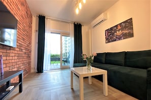 Appartement Premium, 1 chambre, terrasse, vue ville | Coin séjour
