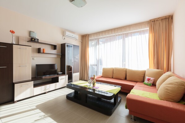 Studio Familial, balcon | Coin séjour