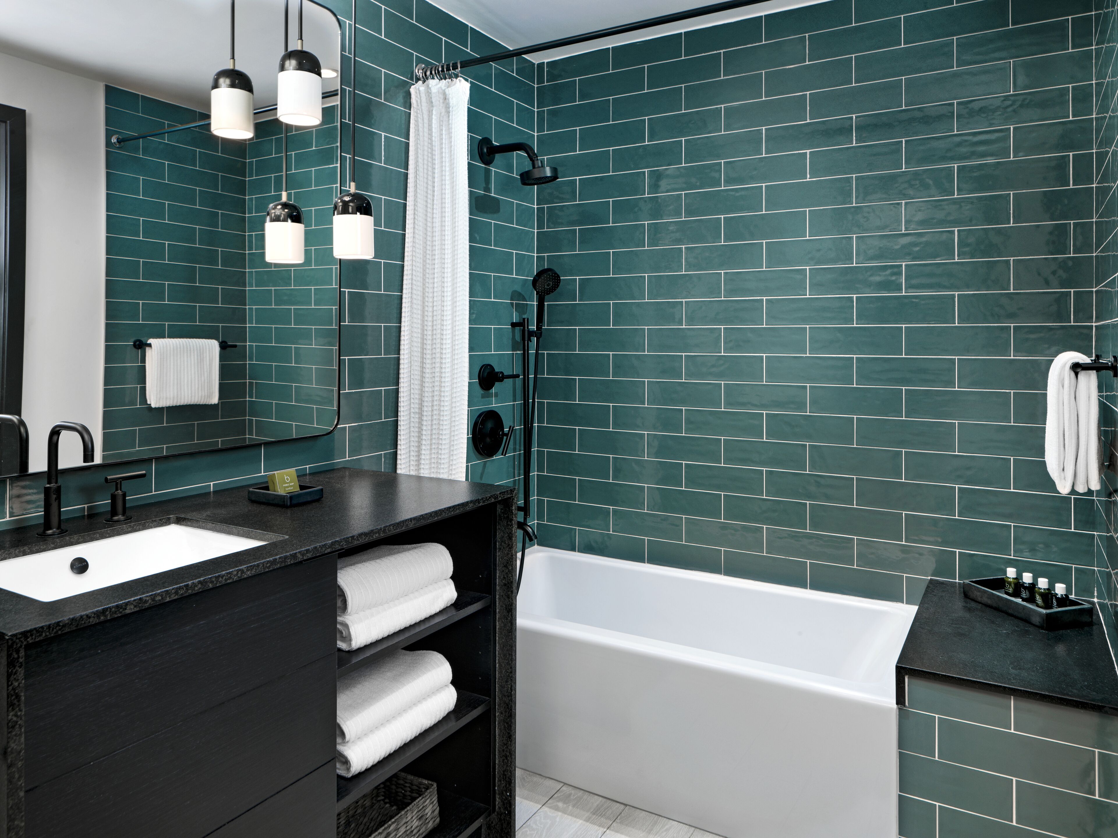 designer toiletries, hair dryer, bathrobes, towels