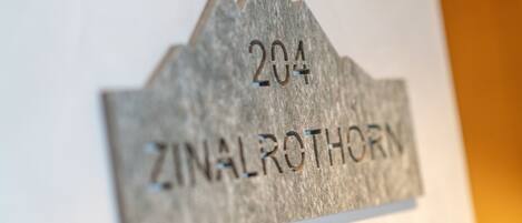 A sign with the number 204 and the name 'ZINALROTHORN'.