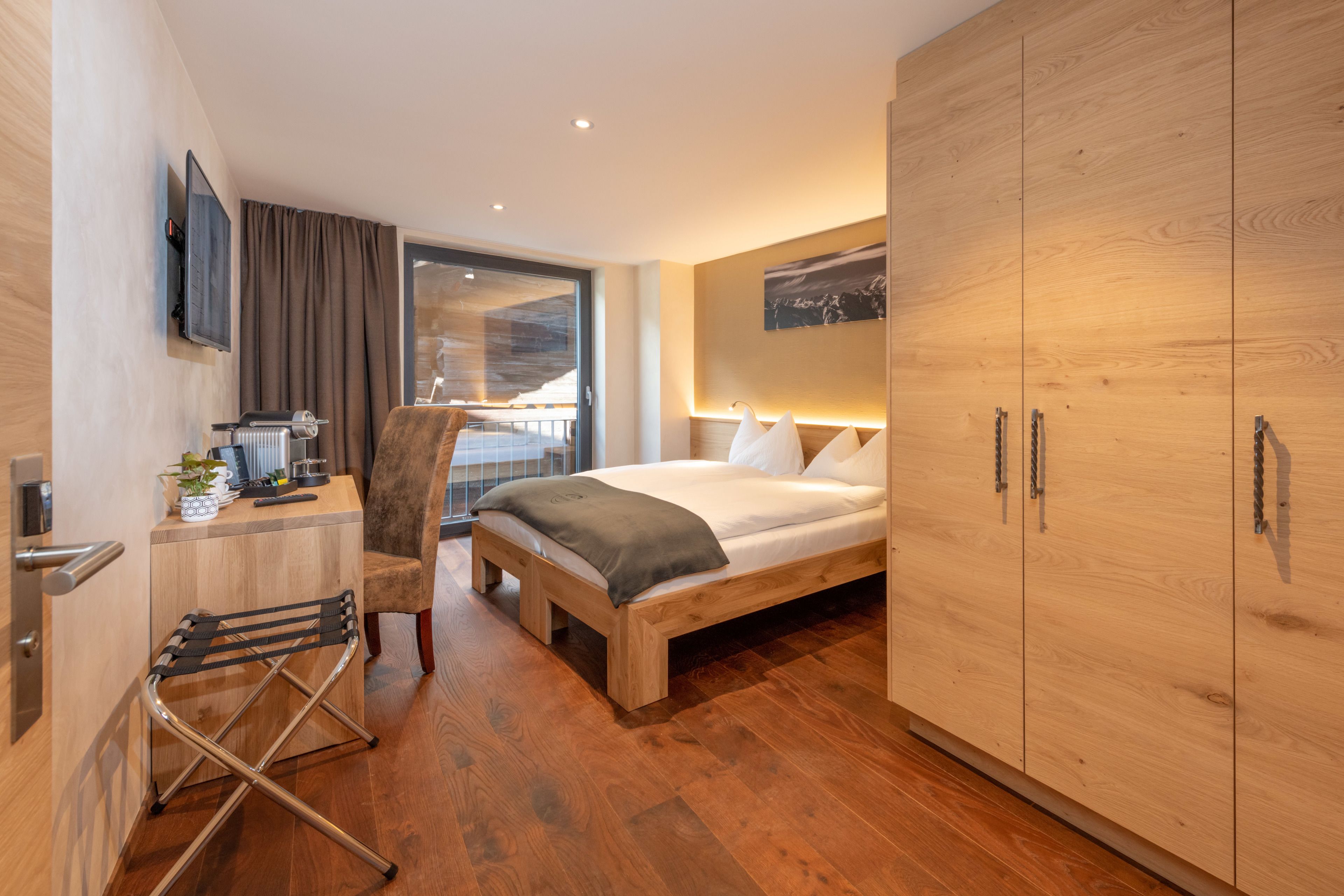 standard double room | premium bedding, down duvets, in-room safe, desk