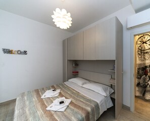 Apartment, 1 Bedroom | 1 bedroom, individually furnished, desk, free WiFi