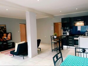 Apartment | Living area | 32-inch LCD TV with satellite channels, TV - Midrand Guesthouse - TASA (Midrand)