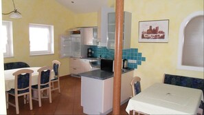 Apartment (SONNBLICK) | Wohnbereich | Fernseher