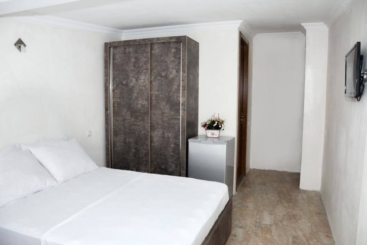 Deluxe-Doppelzimmer, Balkon | Hochwertige Bettwaren, Verdunkelungsvorhänge, kostenloses WLAN