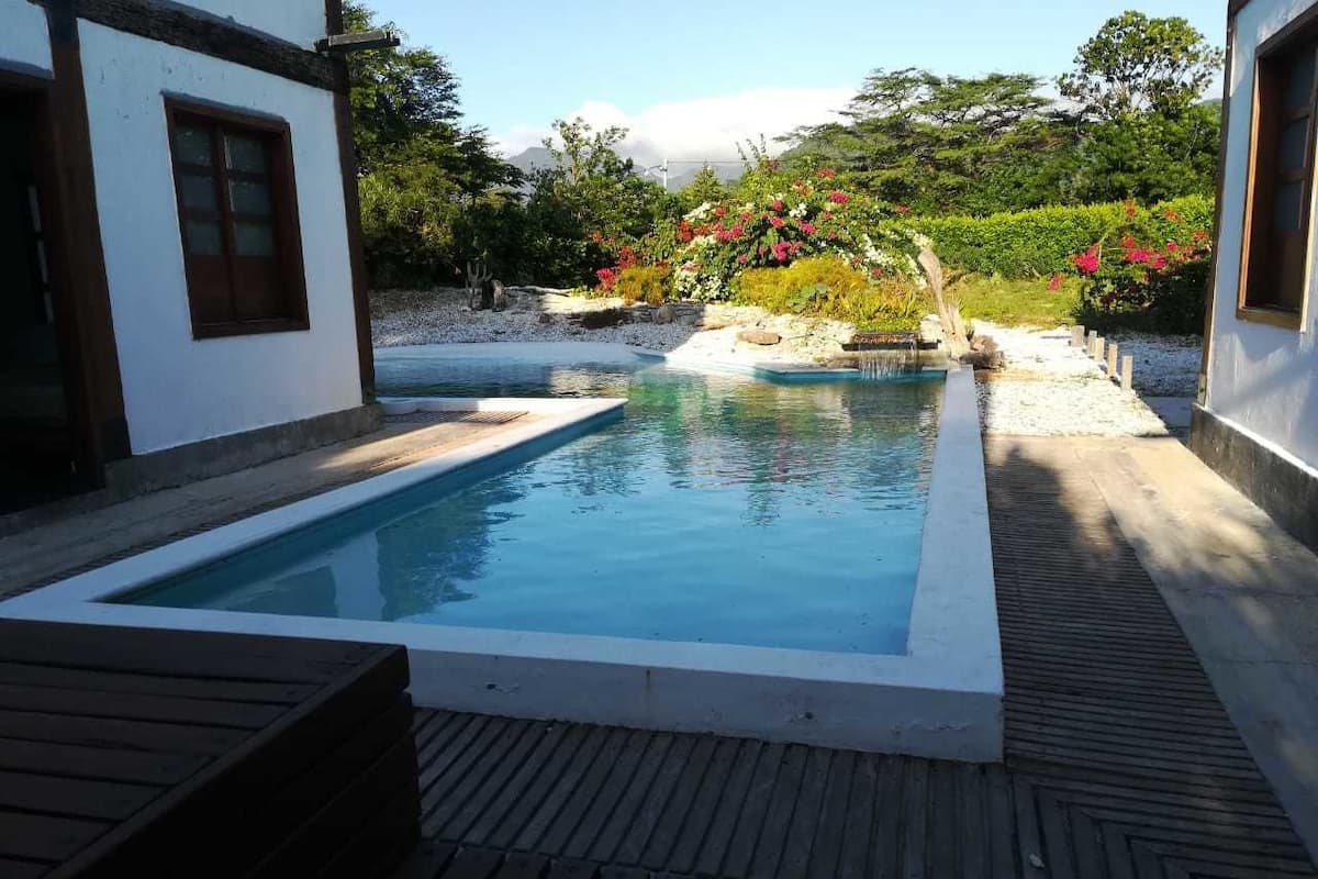 Deluxe House, Multiple Beds, Accessible, Non Smoking | Living area | 32-inch LED TV with cable channels, TV