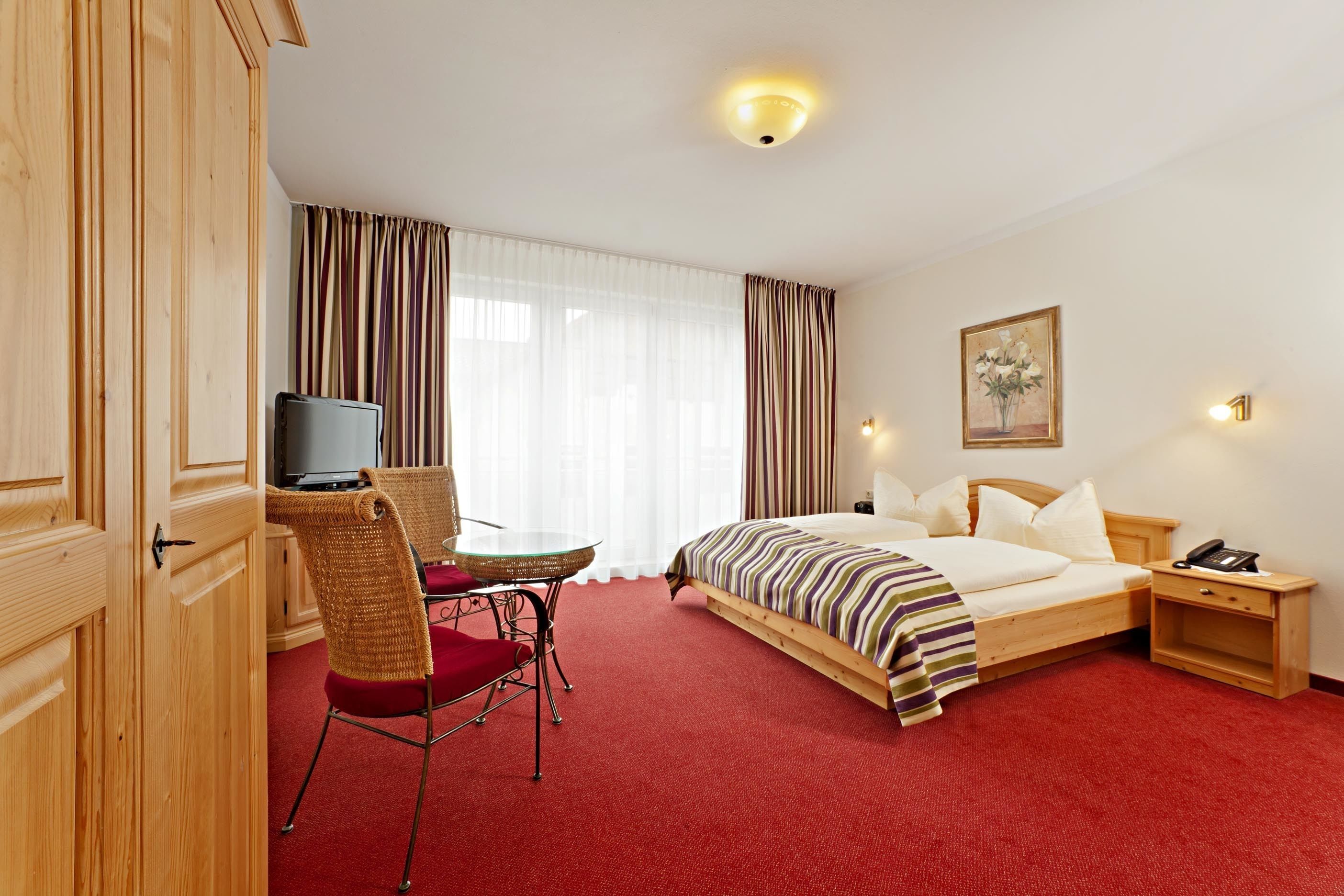 hypo-allergenic bedding, in-room safe, desk, blackout curtains