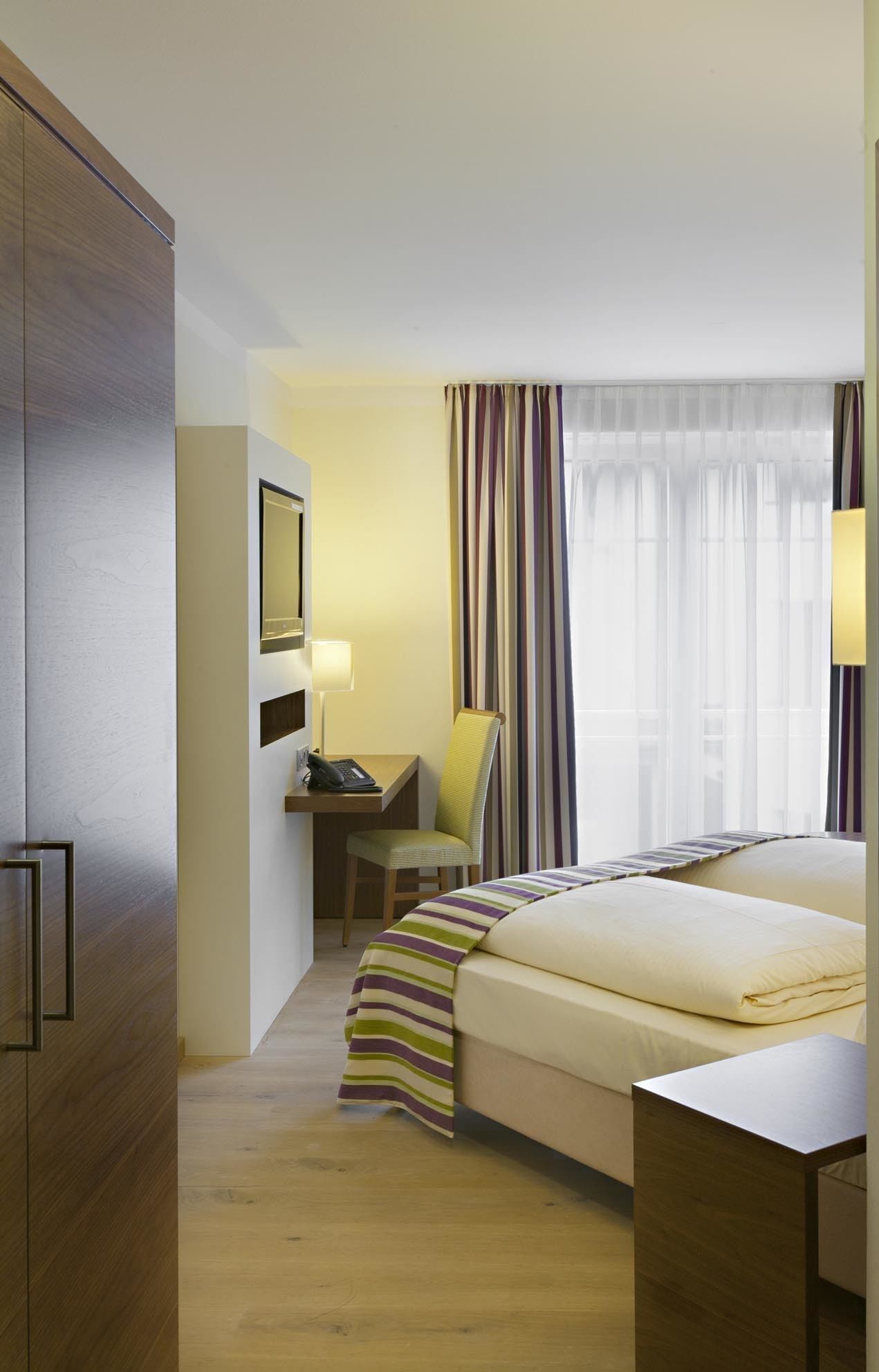 hypo-allergenic bedding, in-room safe, desk, blackout curtains