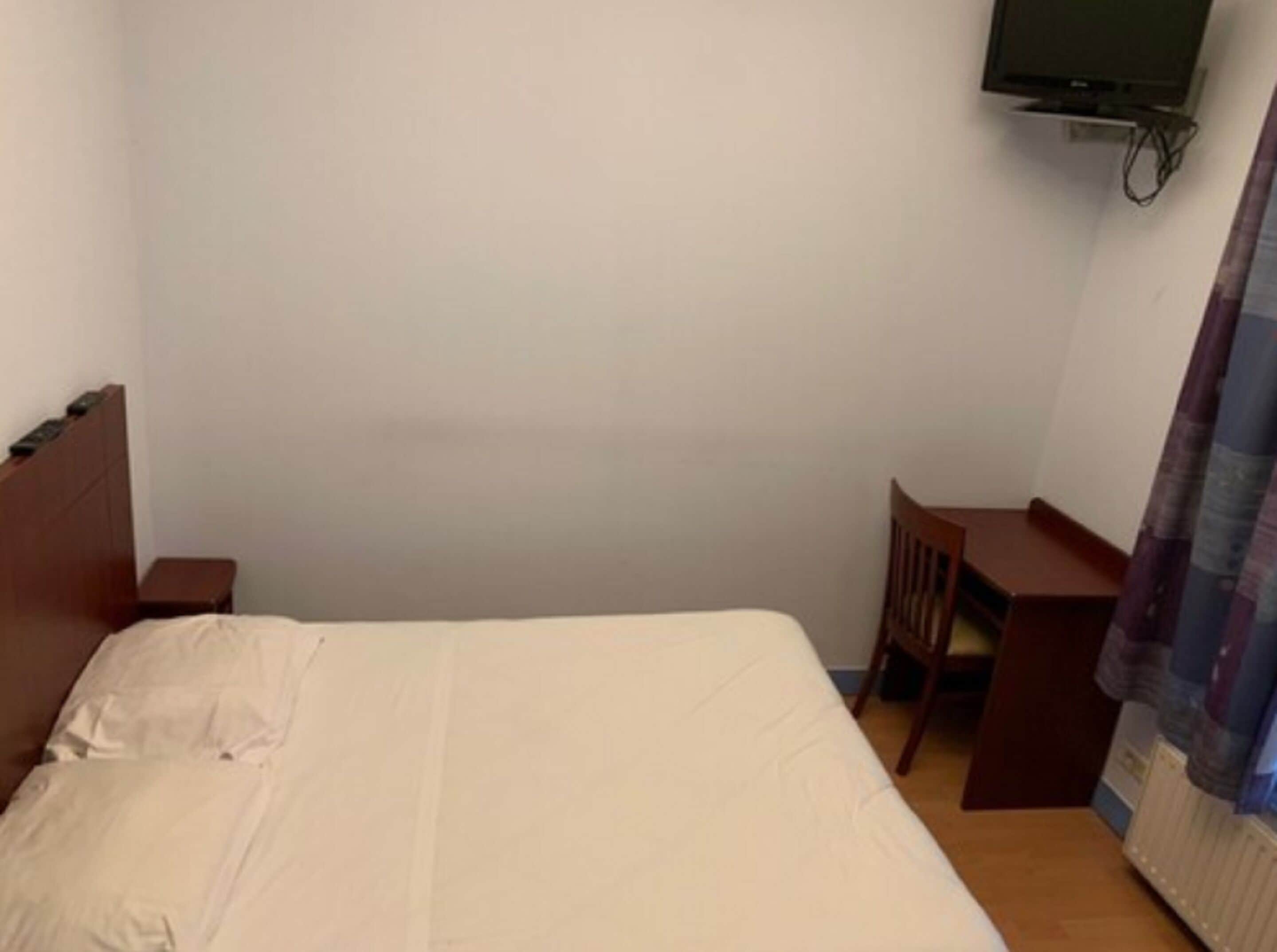 individually decorated, individually furnished, desk, blackout curtains