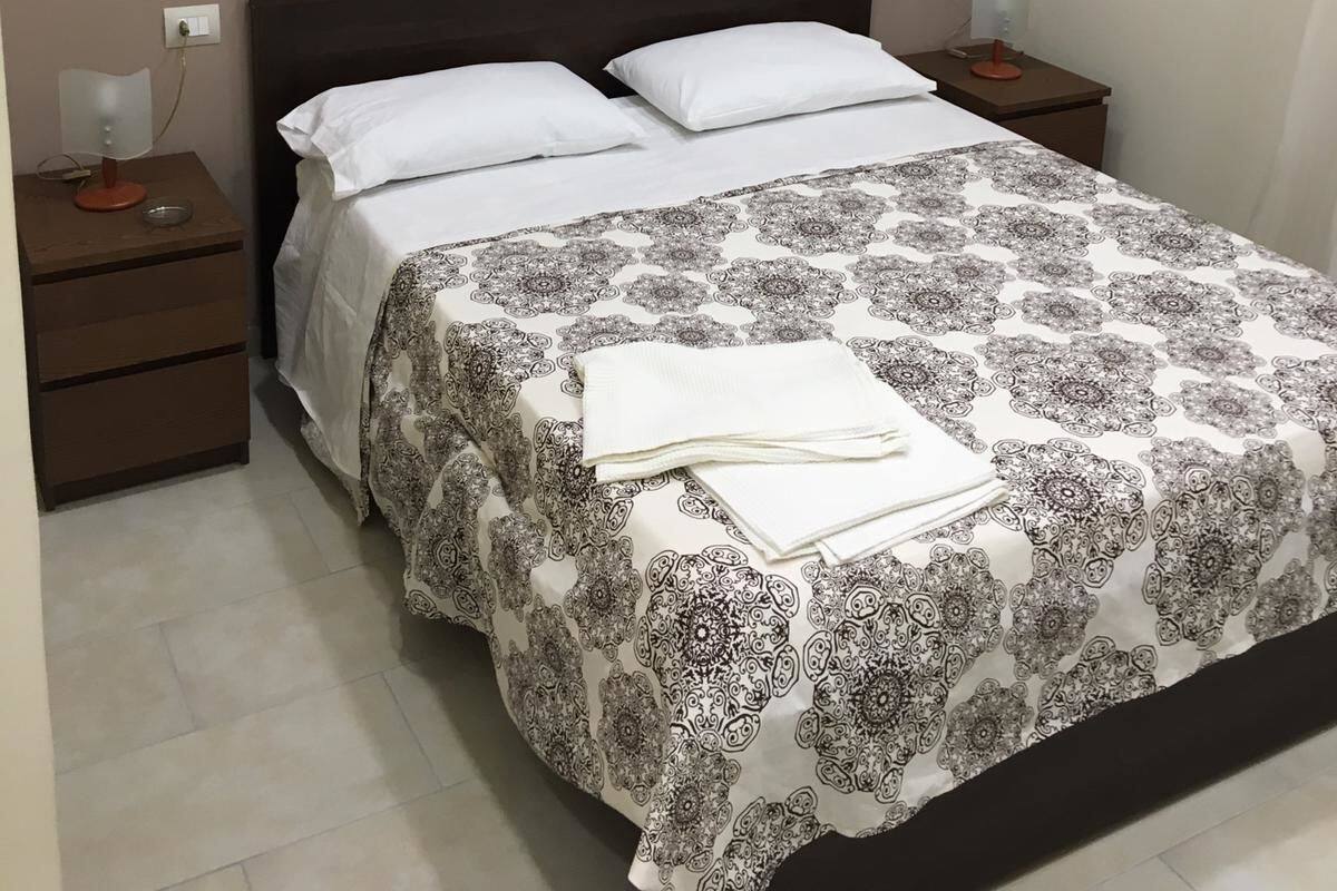 Basic Triple Room (Brown) | Desk, laptop workspace, blackout drapes, iron/ironing board
