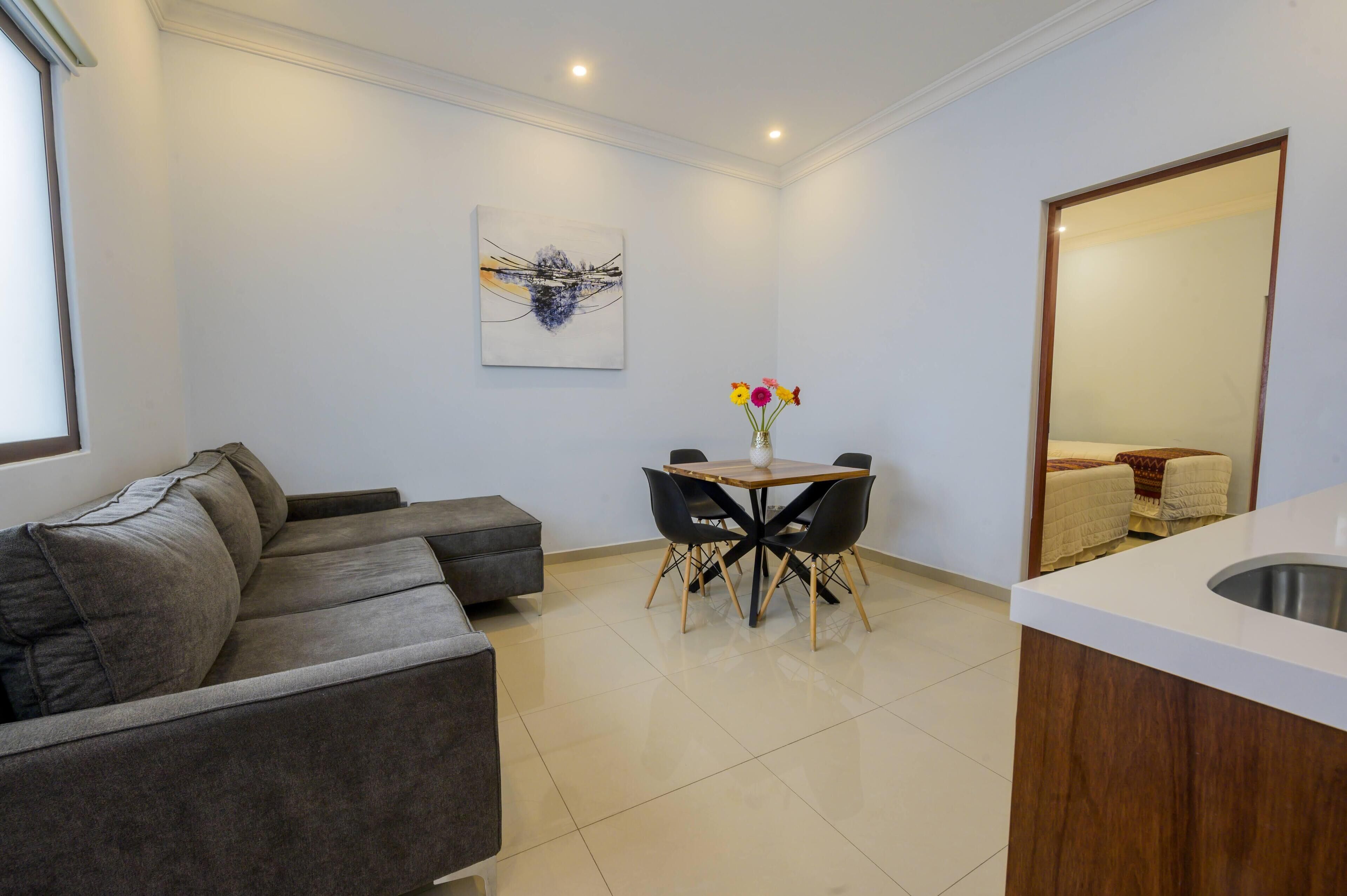 junior suite, 2 bedrooms (sala y comedor) | living area | 55-inch smart tv with satellite channels, tv