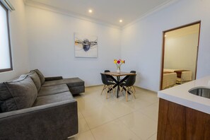 Junior Suite, 2 Bedrooms (sala y comedor) | Living area | 55-inch Smart TV with satellite channels, TV - Suites de la Parra (Oaxaca)