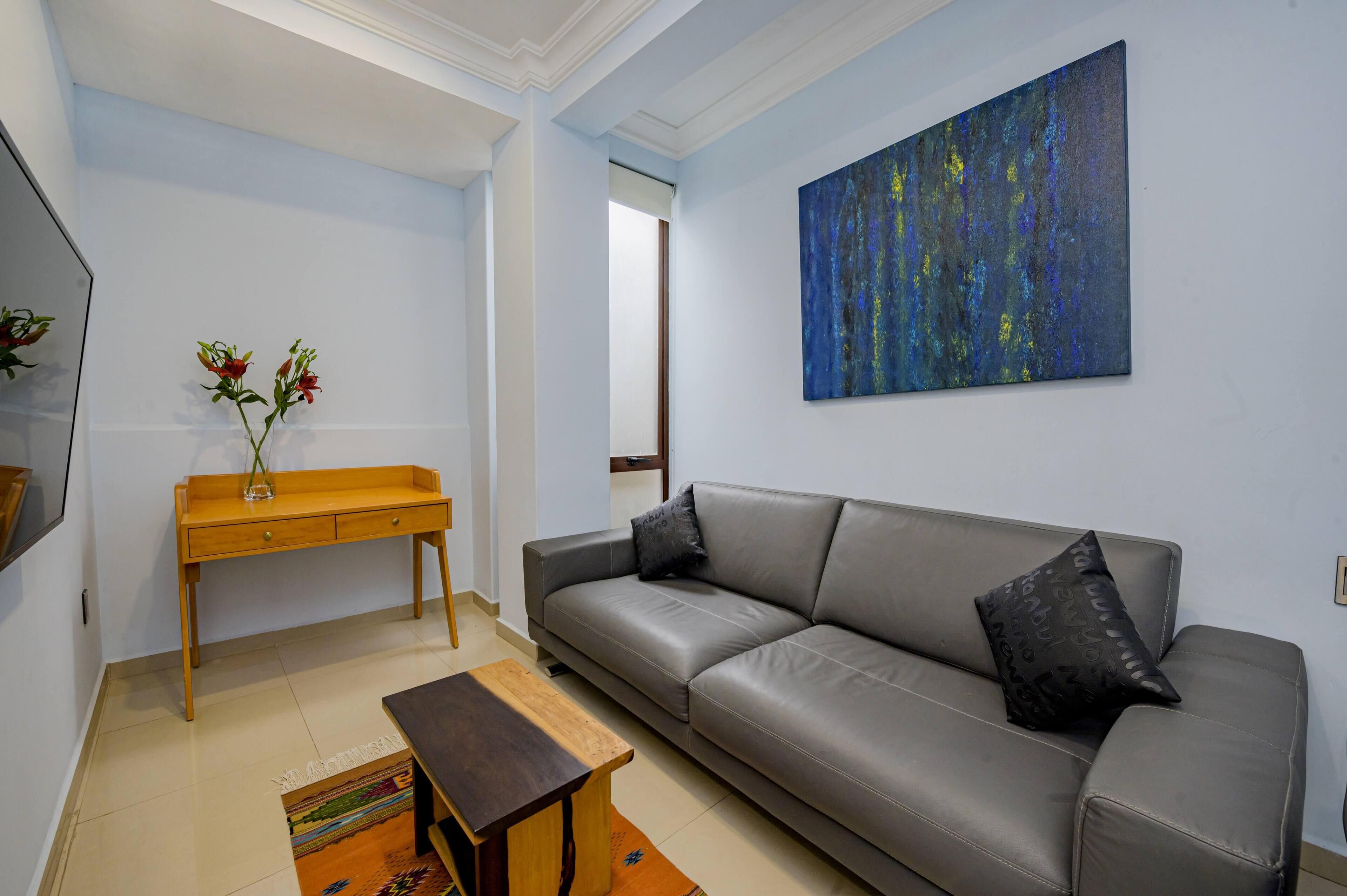 premium room, 1 king bed with sofa bed | living area | 55-inch smart tv with satellite channels, tv