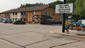 Enjoy a convenient stay with free WiFi and breakfast, plus easy parking and a welcoming entrance.