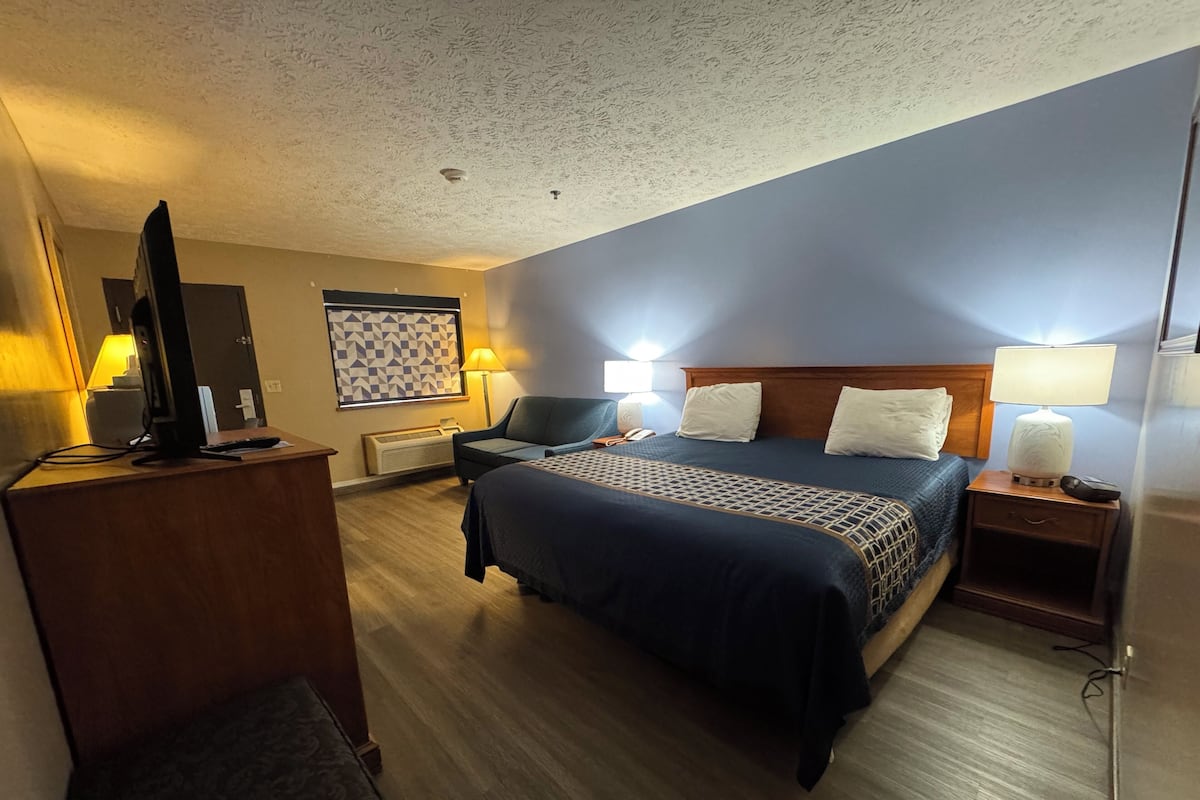 Quarto solteiro standard, 1 cama King, para não fumantes | 1 quarto, individualmente decorados, individualmente mobiliados