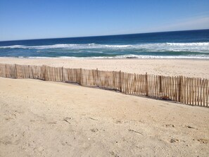 On the beach, sun-loungers