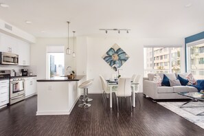 Premier Apartment | Living area | 50-inch Smart TV with cable channels, TV, Netflix - New Downtown LA Luxury Jr. Penthouse (Los Angeles)