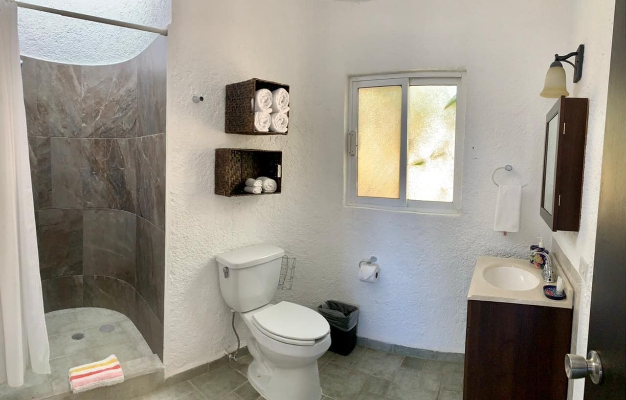 deluxe villa, 2 bedrooms, pool access | bathroom | shower, free toiletries, hair dryer