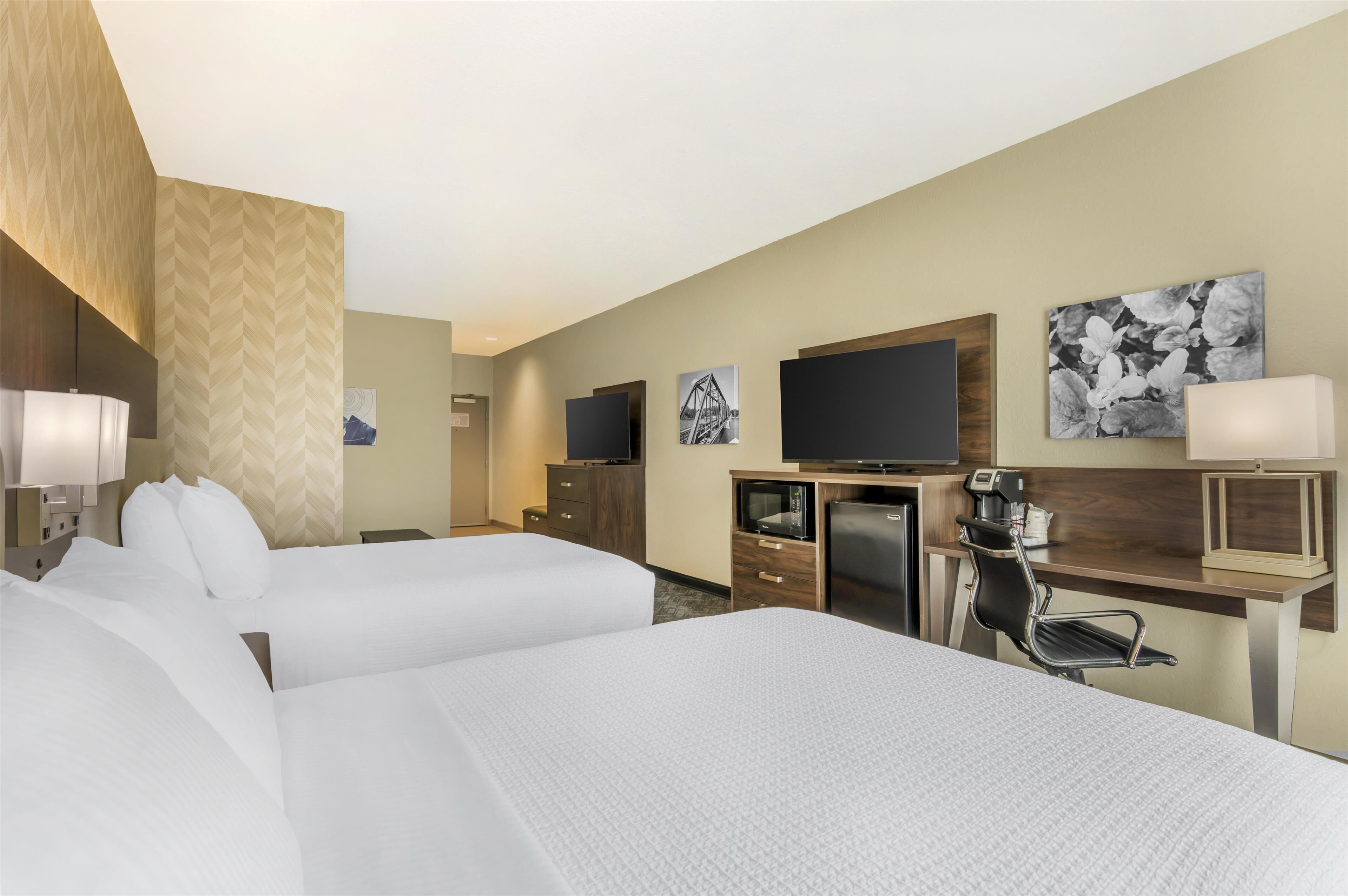 suite, multiple beds, non smoking, refrigerator & microwave (with sofabed) | pillow-top beds, desk, iron/ironing board, free cots/infant beds