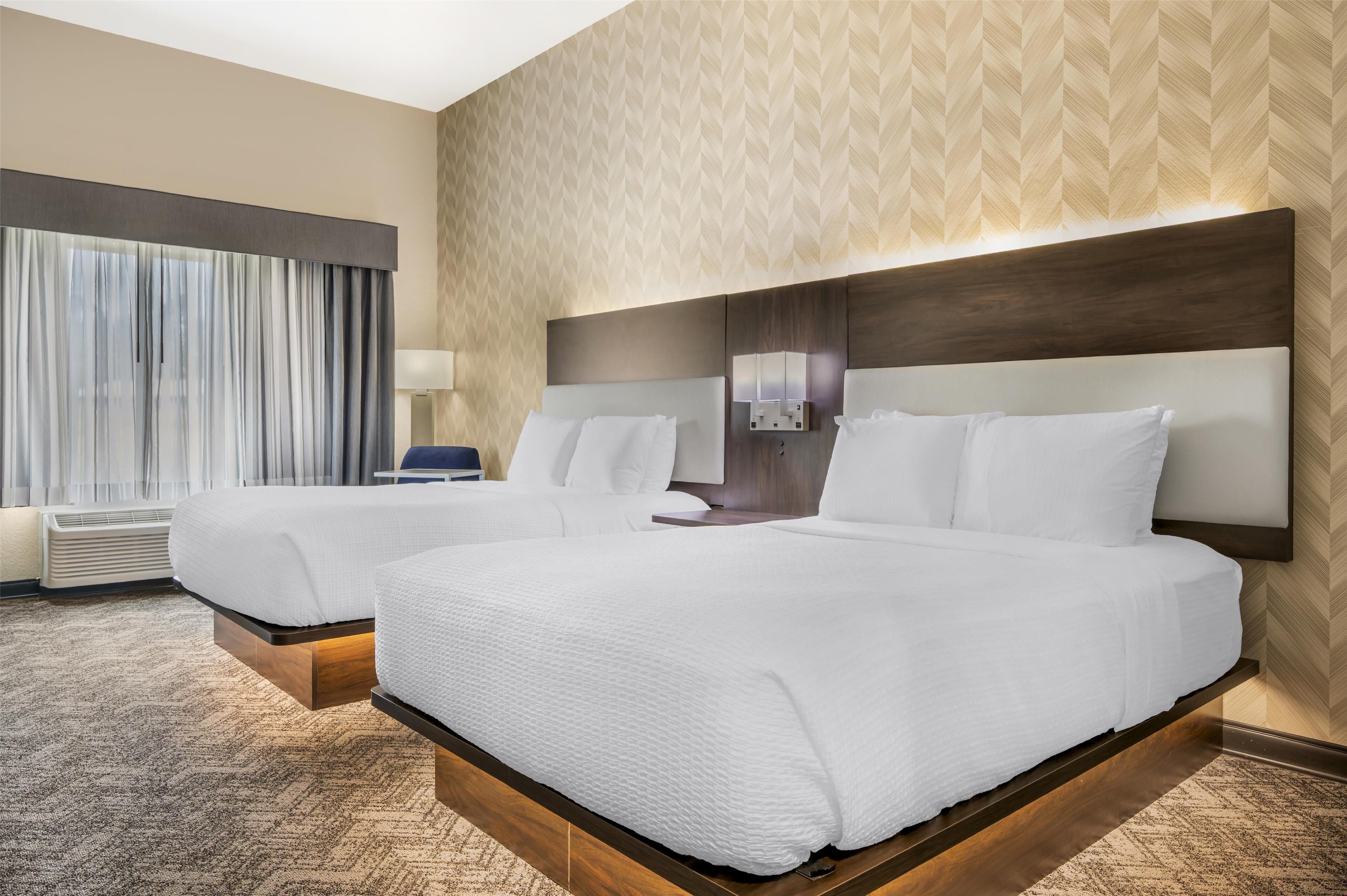 standard room, 2 queen beds, accessible, non smoking | pillow-top beds, desk, iron/ironing board, free cots/infant beds