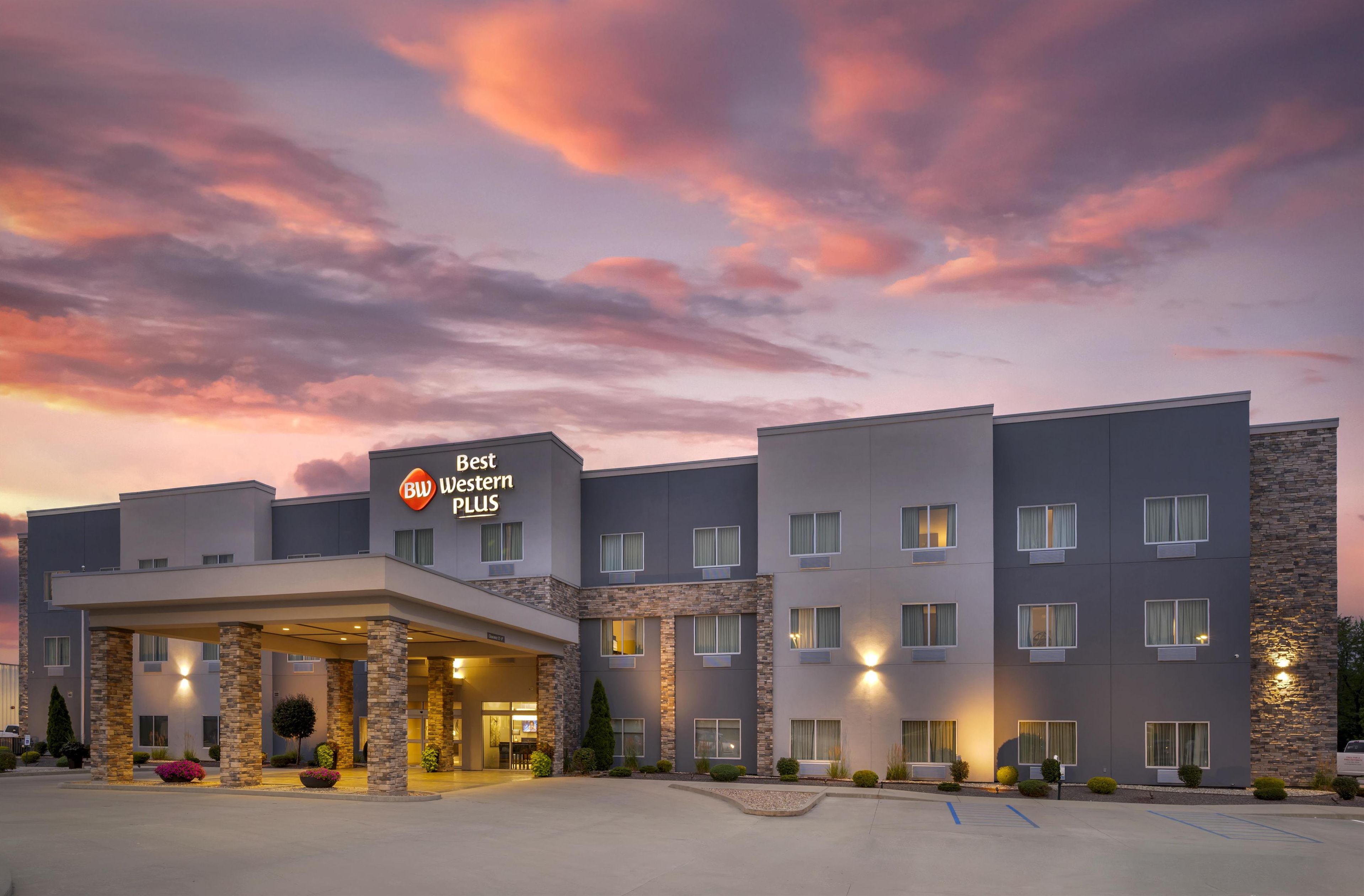 A Best Western Plus hotel with a modern design, featuring a covered entrance and multiple floors.