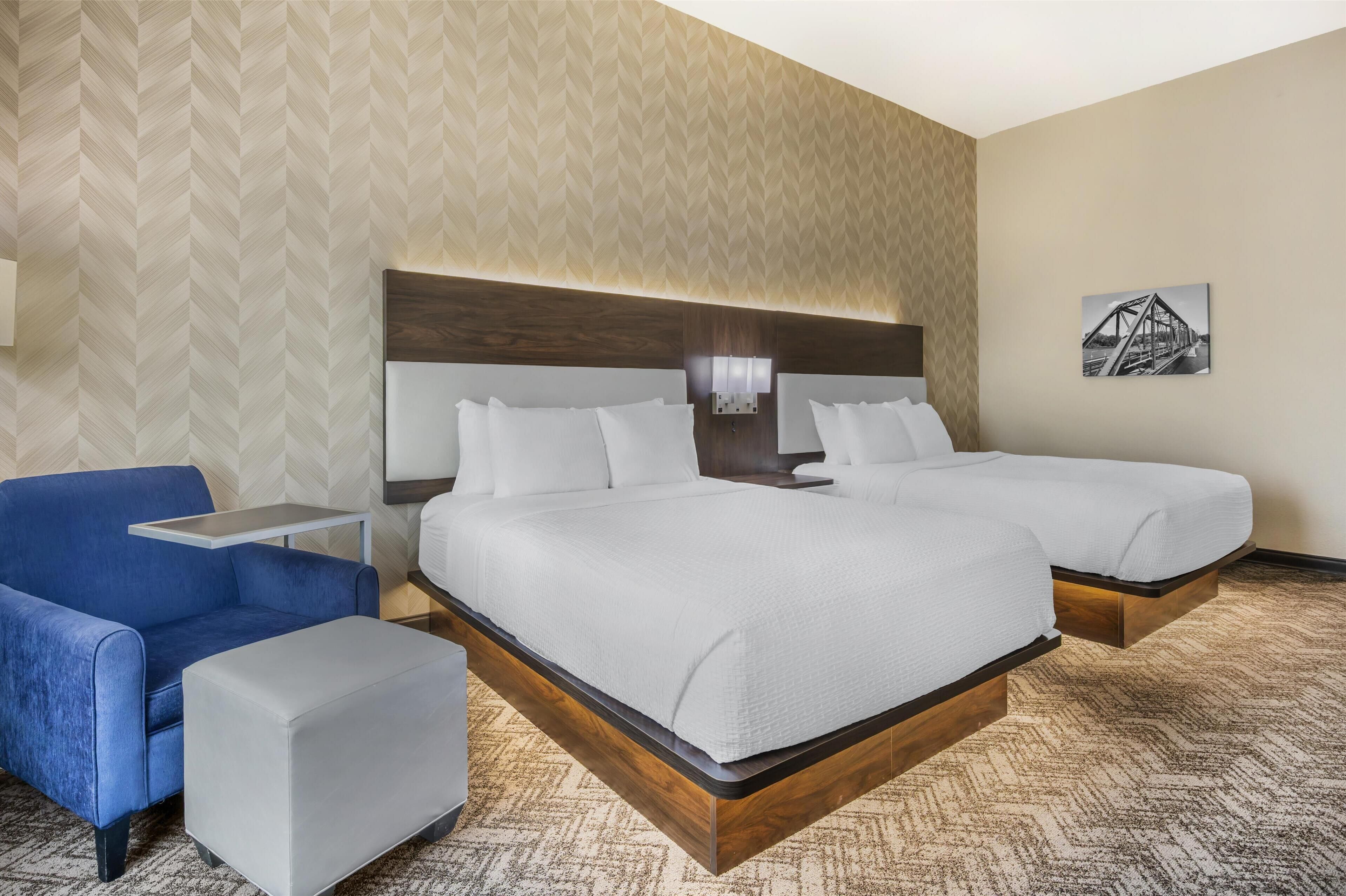 standard room, 2 queen beds, non smoking, refrigerator & microwave | pillow-top beds, desk, iron/ironing board, free cots/infant beds