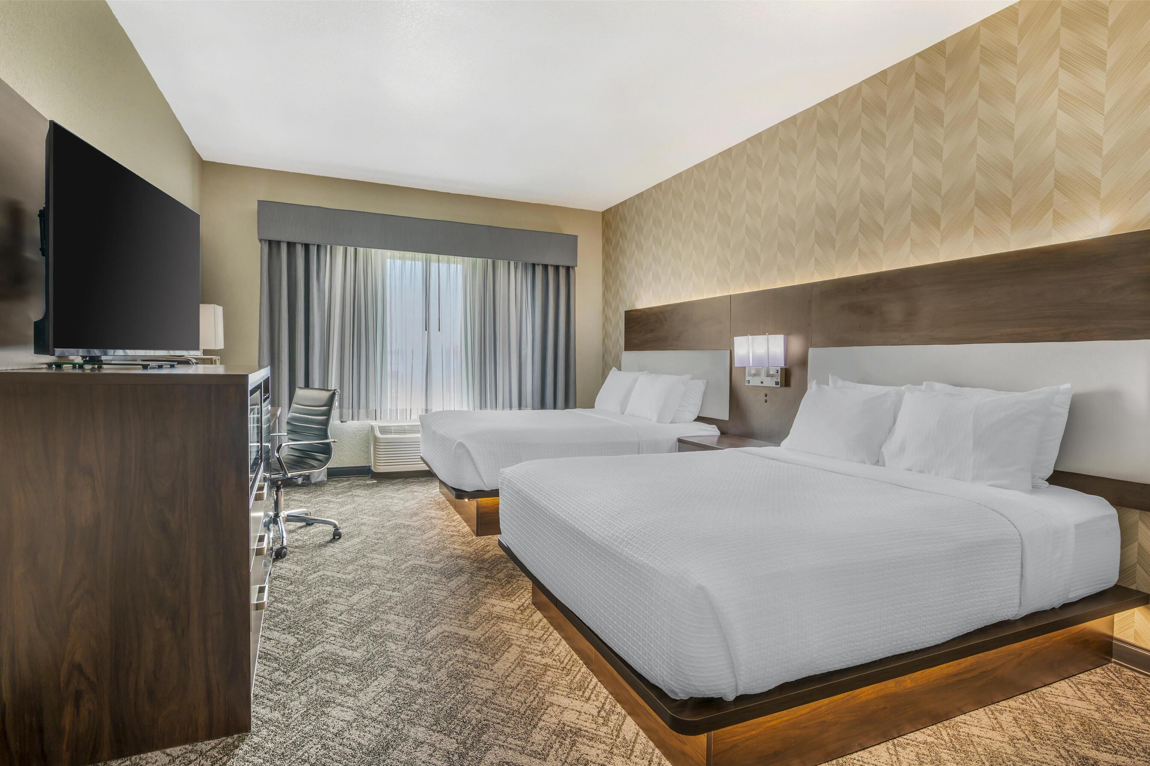 suite, multiple beds, non smoking, refrigerator & microwave (with sofabed) | pillow-top beds, desk, iron/ironing board, free cots/infant beds