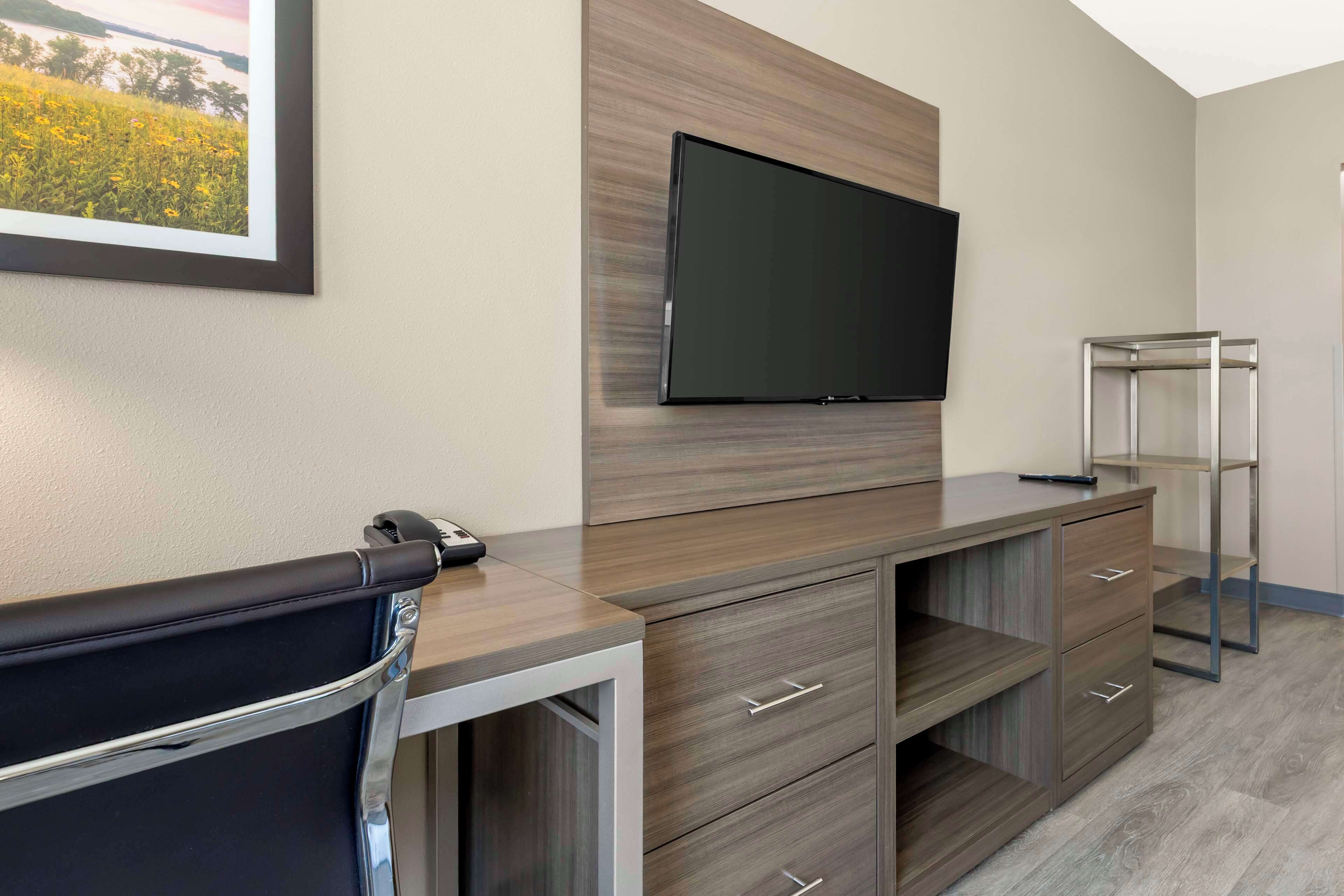 standard room, 1 king bed, non smoking, refrigerator & microwave (walk-in shower) | in-room safe, individually decorated, individually furnished, desk