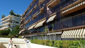 A multi-story hotel with balconies, a swimming pool, and a landscaped garden. - ONE OF THE MOST BEAUTIFUL VIEWS OF NICE / MONT BORON / BASSE CORNICHE -  (Nice)